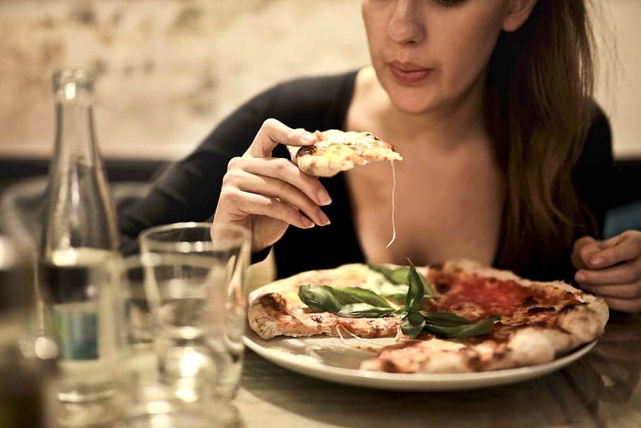 Woman Eating more food in the night during pregnancy